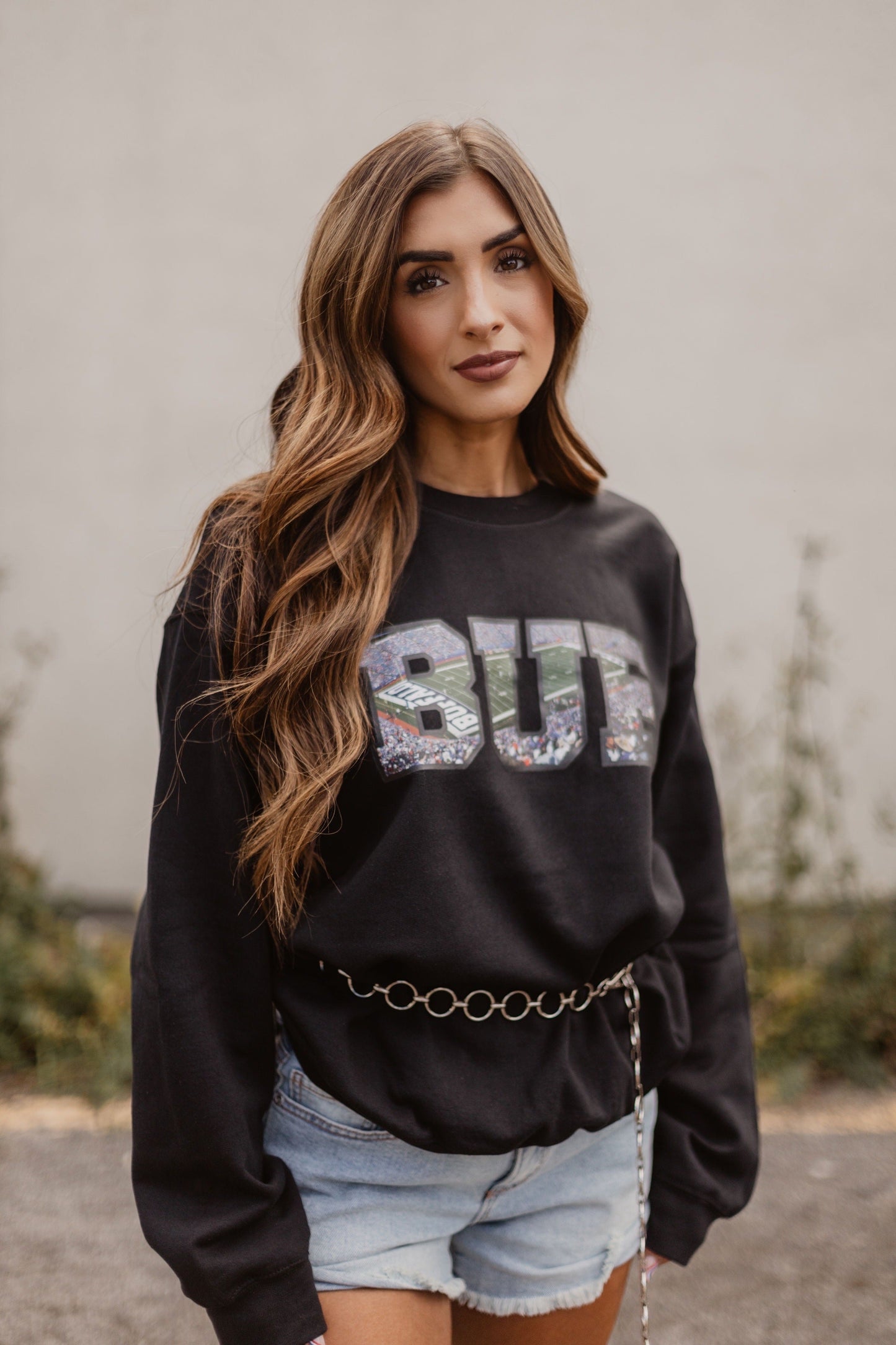 A "View from the Ralph" Crewneck – Comfortable crewneck sweatshirt with iconic "View from the Ralph" design, perfect for Buffalo fans.