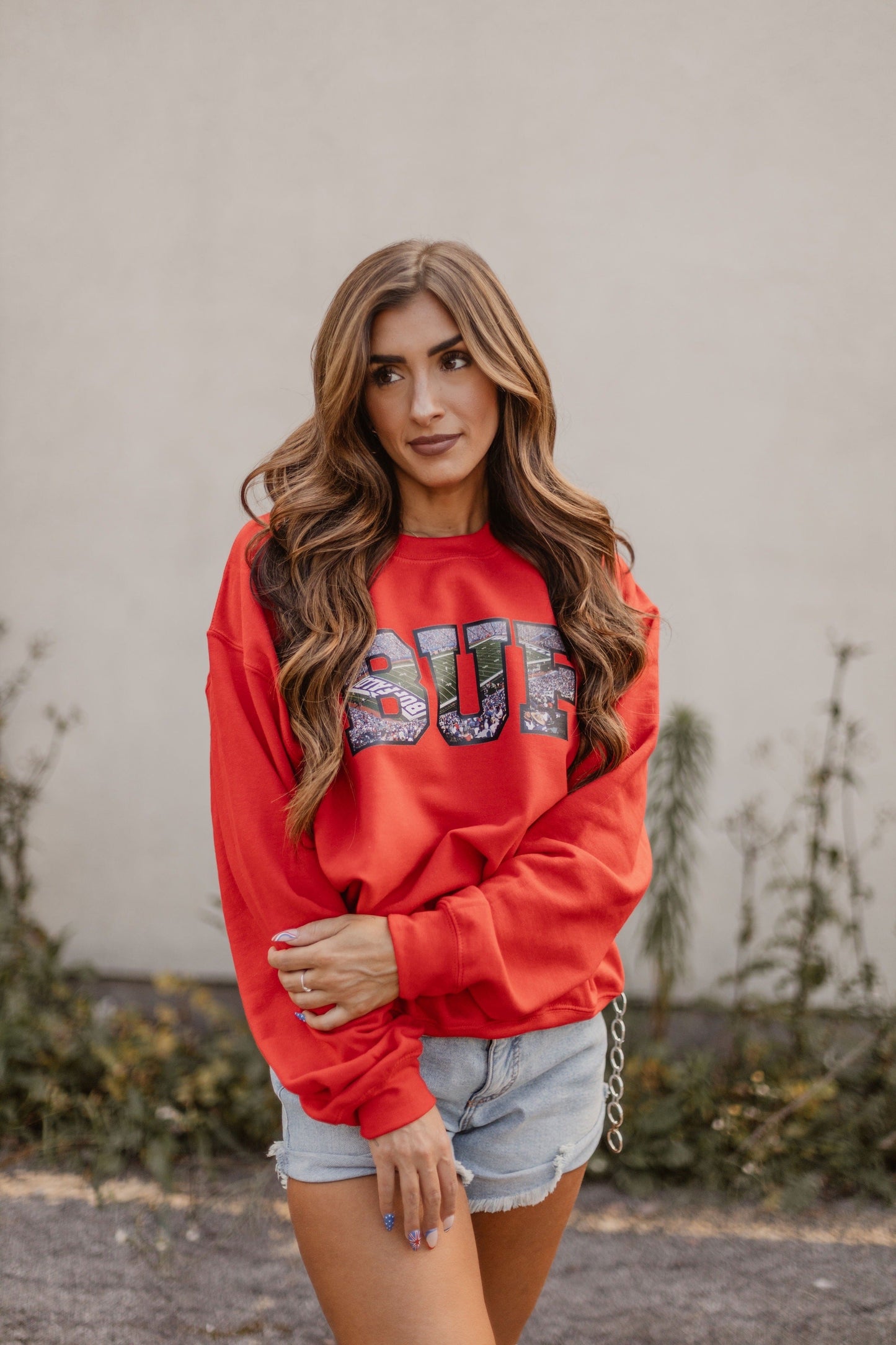 A "View from the Ralph" Crewneck – Comfortable crewneck sweatshirt with iconic "View from the Ralph" design, perfect for Buffalo fans.