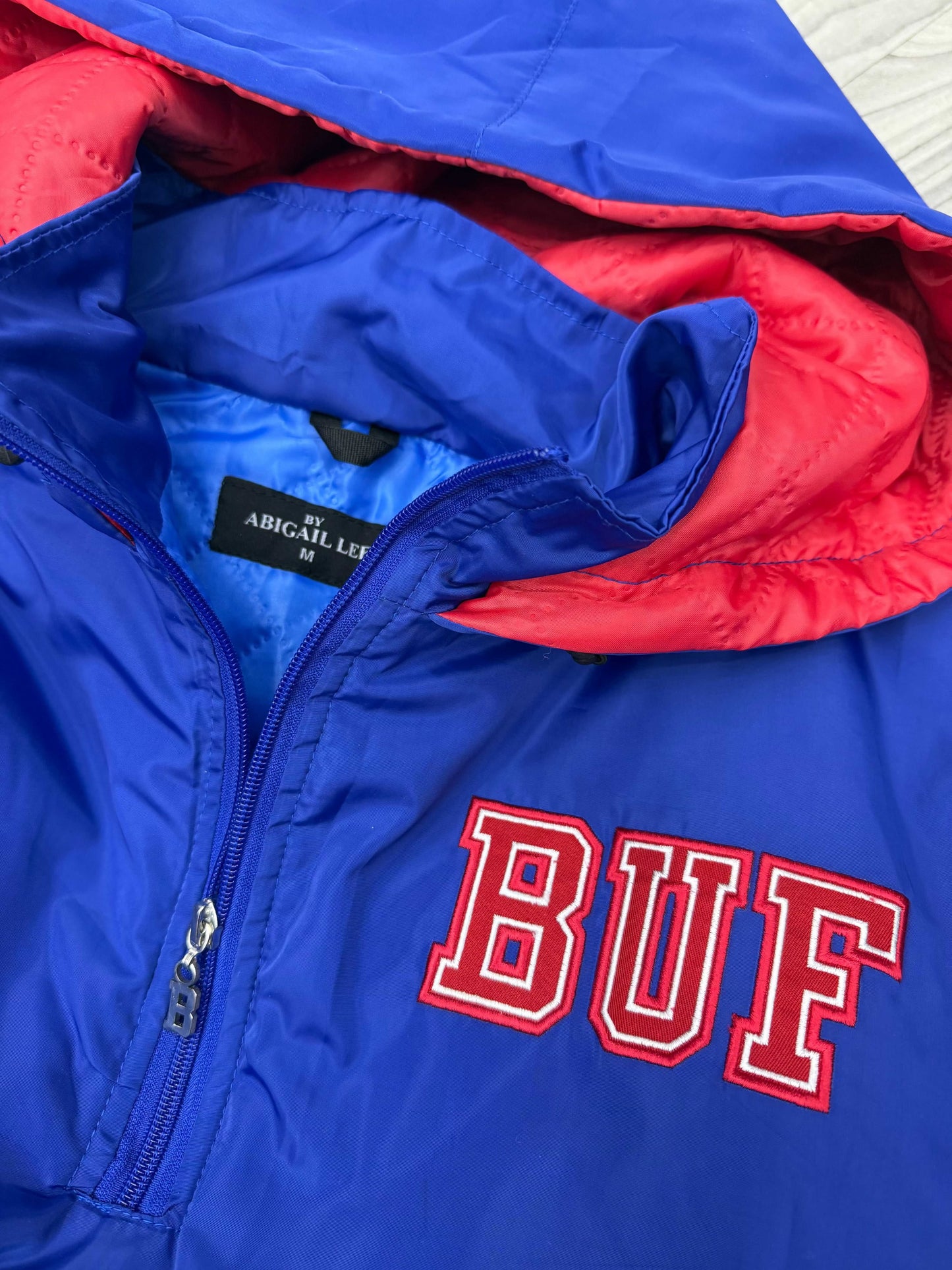 Throwback Stadium Coat close up of embroidered BUF chest detail