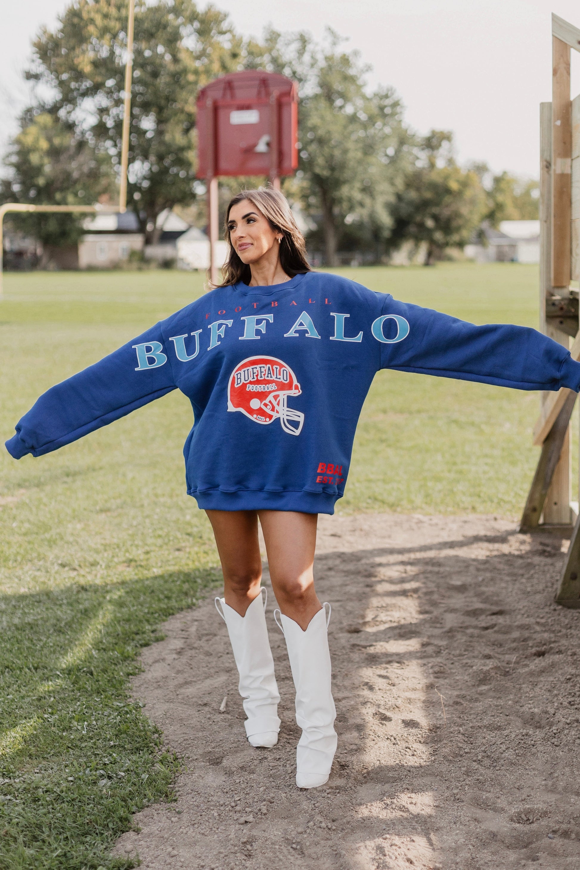 Man wearing a Buffalo Cross Script Vintage Crewneck Sweatshirt.