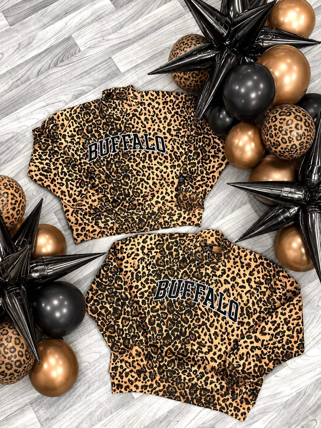 Cheetah print Buffalo sweatshirt with oversized fit and embroidered mock neck design