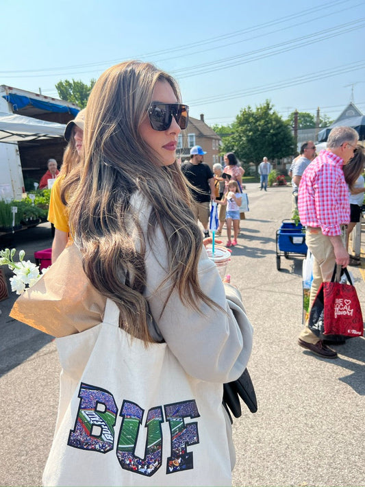 A View From the Ralph Market Tote – Stylish and spacious tote bag featuring the iconic "View From the Ralph" design, ideal for game days and daily use.