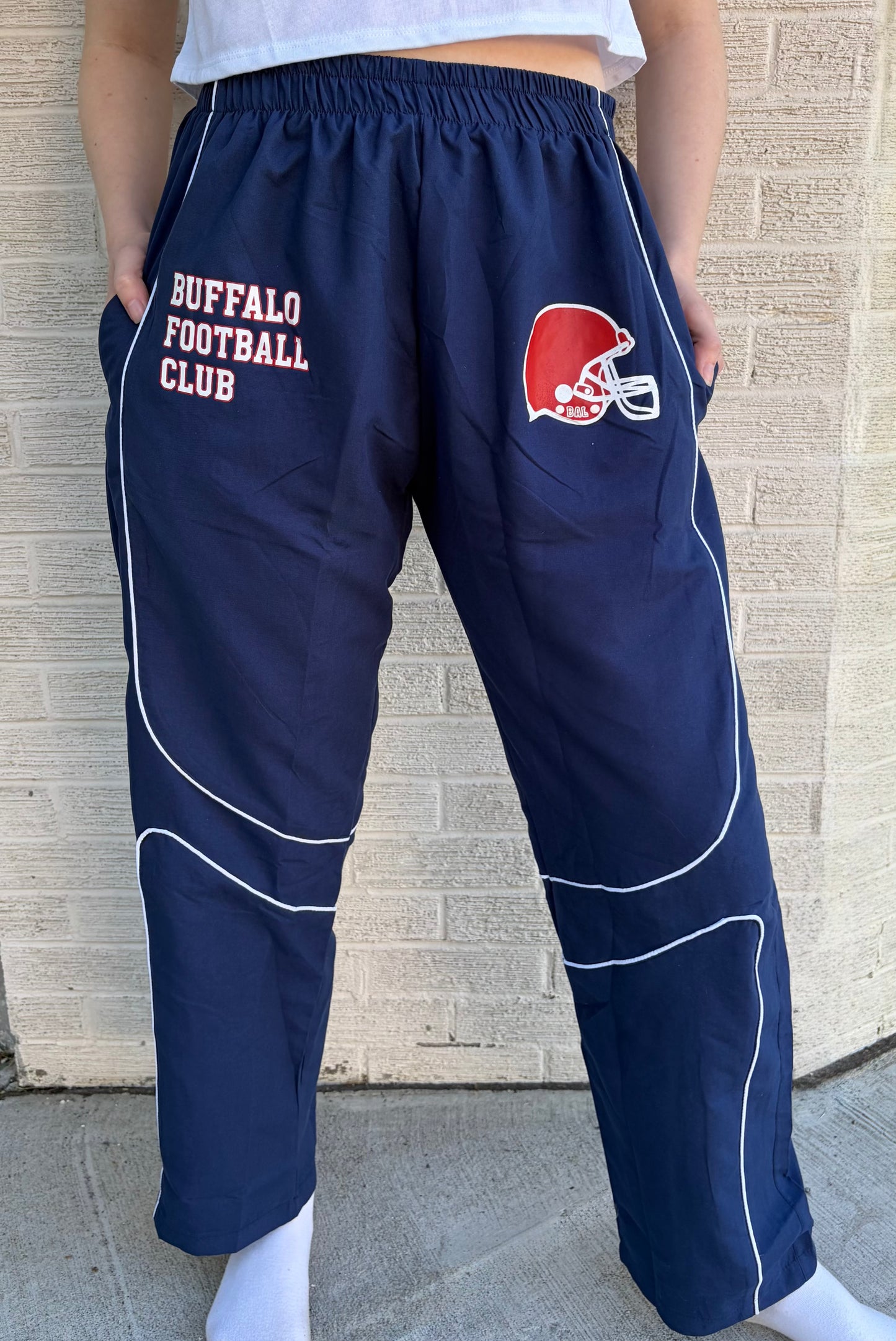 Buffalo Football Club track pants with contrast piping and exclusive graphics