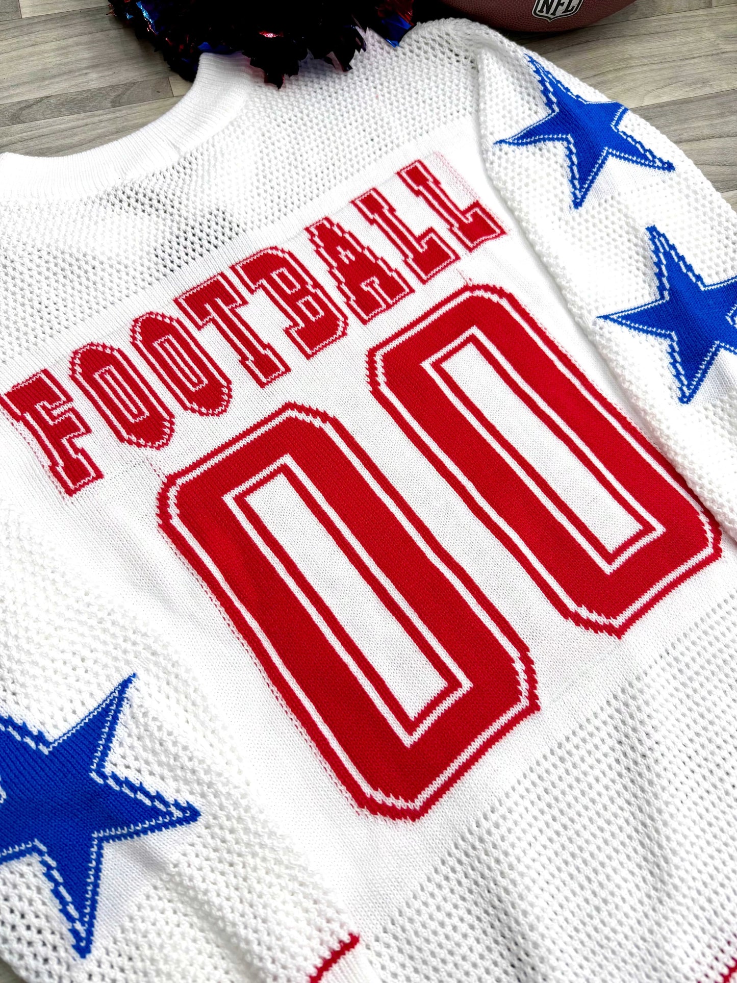 Buffalo football knit sweater front design with Buffalo lettering and 00 number