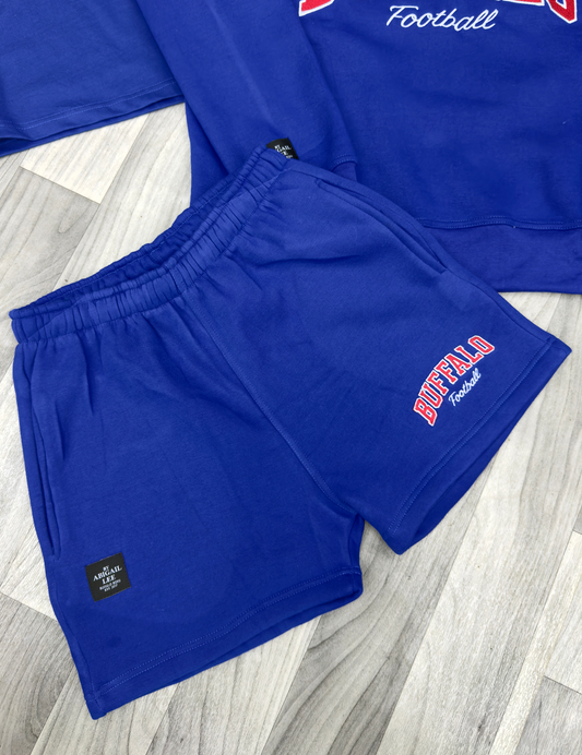High-waisted Buffalo football shorts in soft fleece with varsity graphic and side pockets for women